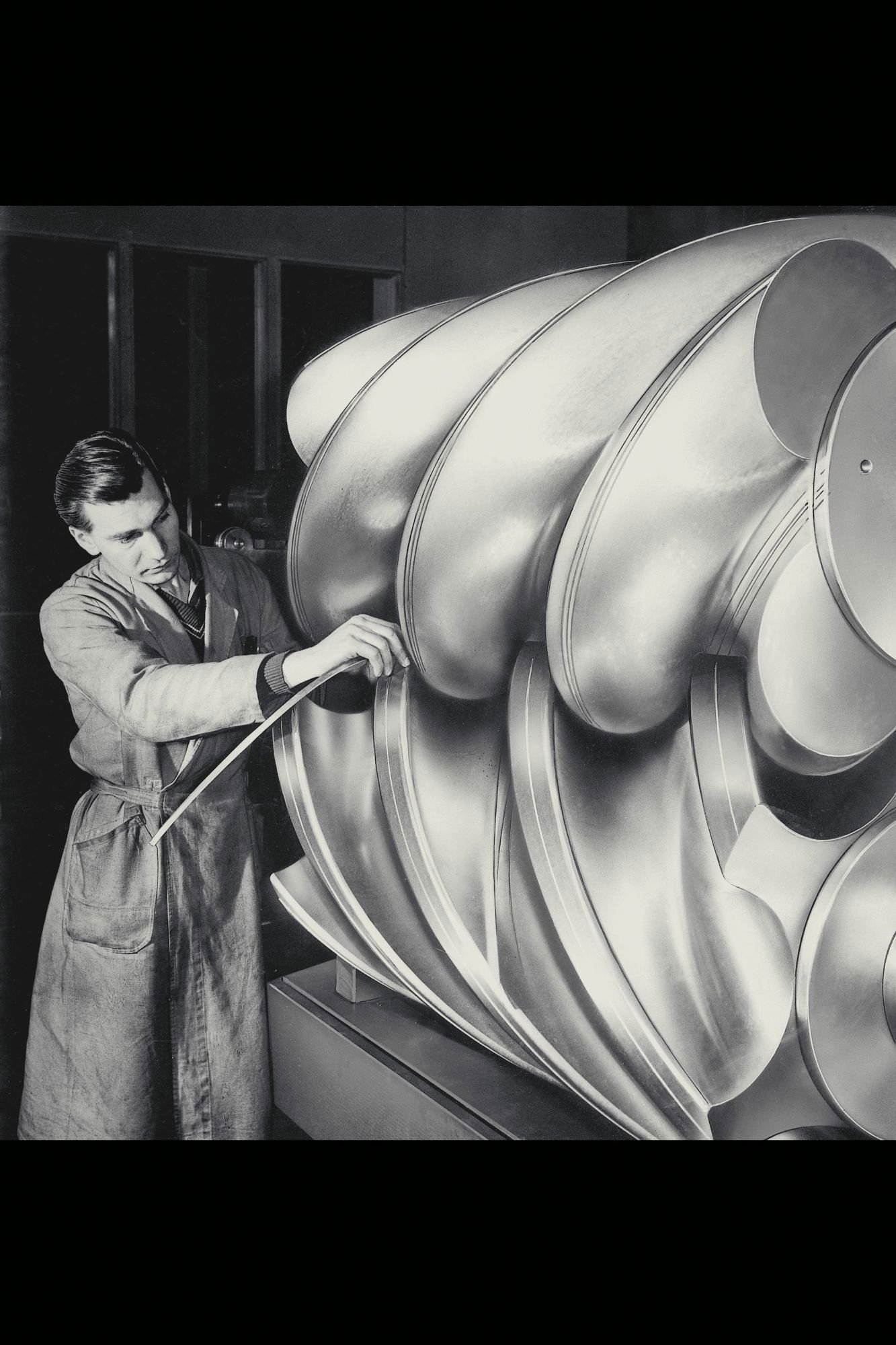 Rotors of a screw compressor - an old black-and-white photo